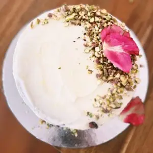 White Chocolate Pistachio Cheesecake with Dark Chocolate Cookie Crust